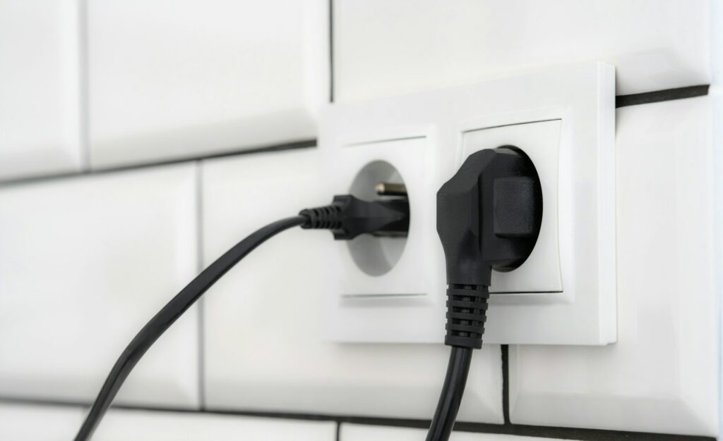 Electrical plug in socket